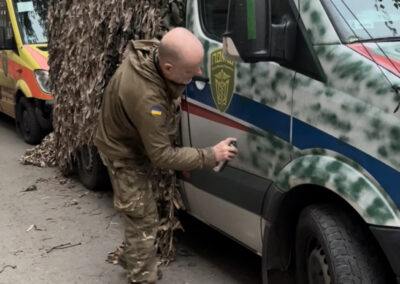 The night before, we were ambushed in a bright yellow ambulance. the next day, car paints were sourced and here we attempt to make the vehicles less obvious. A captured Russian sniper admitted getting a financial bonus for targeting medics.
