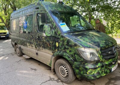 Our handy-work with a spray can! Just after this makeover, a drone was overhead and artillery strikes hit the nearby street.